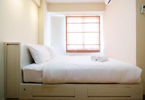 Bedroom Connect to Pool 2BR Apartment at Bassura City by Travelio