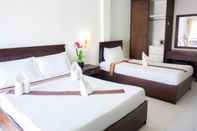 Bilik Tidur Moon Inn Hotel