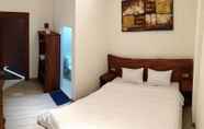 Kamar Tidur 7 The Emerald Inn