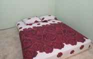 Kamar Tidur 7 OYO 91682 Homestay Sriti