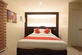 Kamar Tidur 4 OYO 115 Northridge Mansions