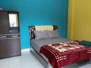 Bedroom 4 Guest House Maqila