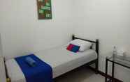 Kamar Tidur 5 Red And Blue Hotel