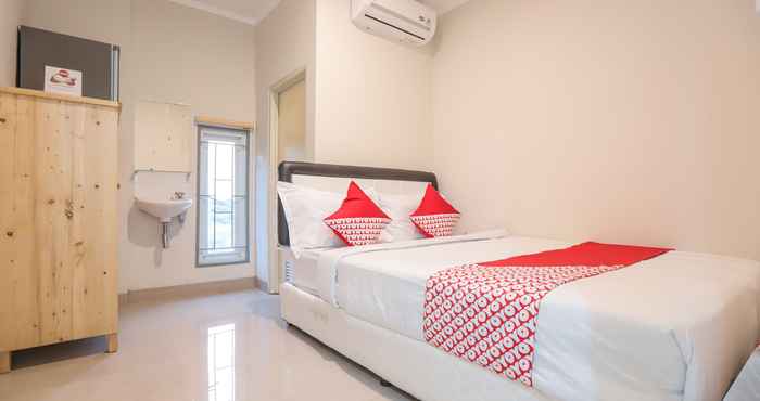 Kamar Tidur OYO 387 Alfa Guest House