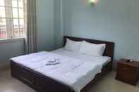 Kamar Tidur Red Sun Hotel