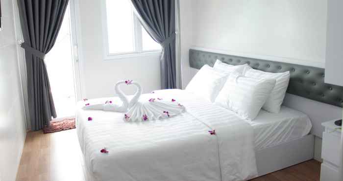 Kamar Tidur Dragon Hotel 1