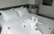 Kamar Tidur 3 Dragon Hotel 1