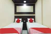 Kamar Tidur Niche Valley Hotel