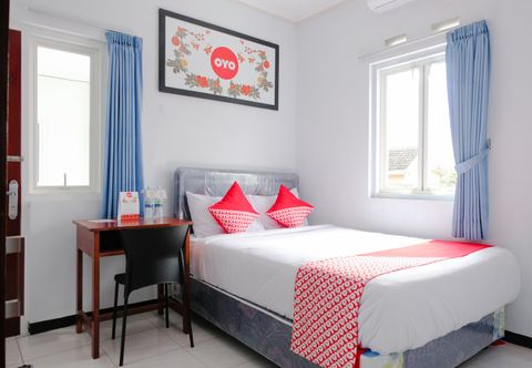 Kamar Tidur OYO 437 Hnr Homestay Syariah