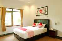 Bedroom OYO 517 Hotel Arjuna Lawang