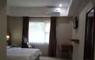 Kamar Tidur 4 Clover Guest House 