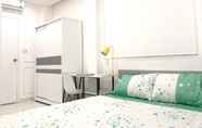 Kamar Tidur 4 Smiley Apartment 8