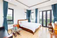 Kamar Tidur Sunny Hotel & Apartments