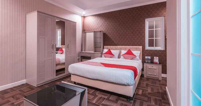 Bedroom OYO 371 Kwitang Guest House Near RSPAD Gatot Soebroto