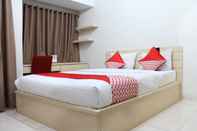 Kamar Tidur OYO 266 Margonda Residence 5