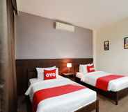 Kamar Tidur 2 OYO 557 Tong House Resort