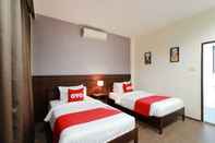 Kamar Tidur OYO 557 Tong House Resort