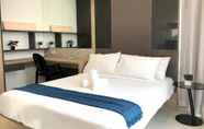 Kamar Tidur 7 The Robertson by Urban Suites