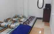 ห้องนอน 7 Sakinah Homey near Kutisari Road