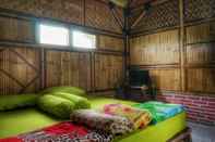 Kamar Tidur Rumah Kebun Lulu Villa