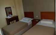 Kamar Tidur 7 Poly Star Hotel