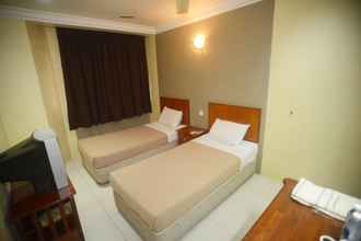 Kamar Tidur 4 Poly Star Hotel