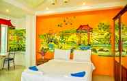 Bedroom 7 Thai Orange Magic