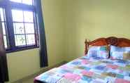 Kamar Tidur 7 Full House 3 Bedroom at Punai Homestay by FH Stay