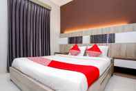 Phòng ngủ OYO 747 Cipunegara Residence