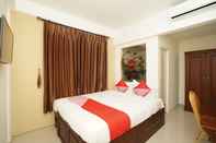 Phòng ngủ Super OYO 781 Erga Family Residence Syariah