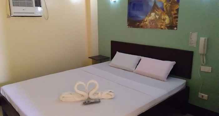 Kamar Tidur Amore Apartelle