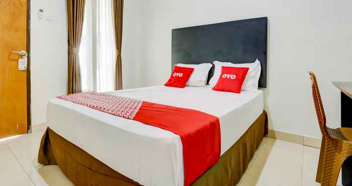 Kamar Tidur OYO 3884 Dixie Syariah Guest House