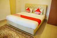 Kamar Tidur OYO 733 Mina Homestay