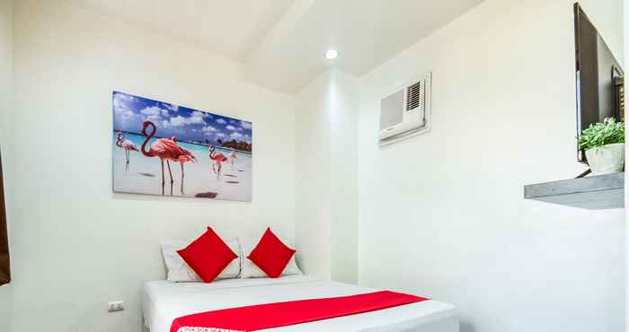 Kamar Tidur OYO 443 Maria Cristina Arcade Suites