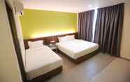 Bedroom 4 Pantai Regal Boutique Hotel