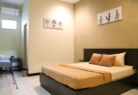 ห้องนอน Hotel Teratai Mas