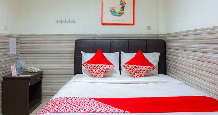 Kamar Tidur OYO 730 Wisma 38