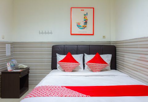 Bedroom OYO 730 Wisma 38