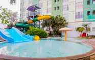 Swimming Pool 2 2BR Apartment at Dian Regency by Travelio