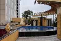 Swimming Pool Strategic 2BR Apartment at Trillium Residence by Travelio