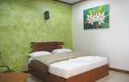 Kamar Tidur 6 Country Inn Hotel