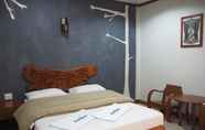 Kamar Tidur 7 Country Inn Hotel