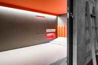 ห้องนอน Circular House Capsule Hotel