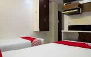 Kamar Tidur 4 OYO 165 Circle-b Apartelle & Suites