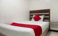 Kamar Tidur 6 OYO 165 Circle-b Apartelle & Suites