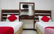 Kamar Tidur 3 OYO 165 Circle-b Apartelle & Suites