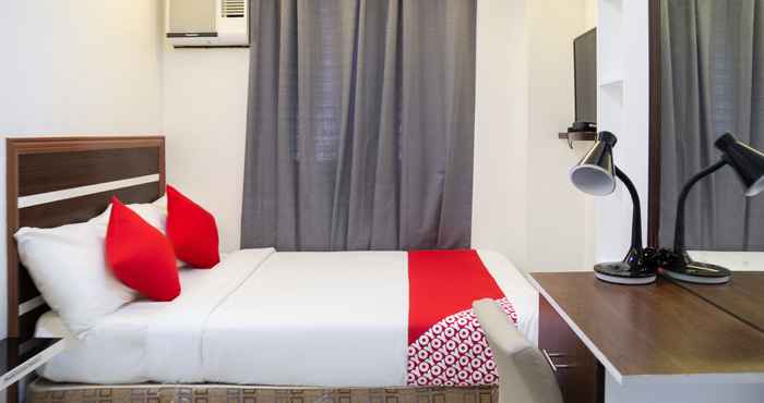 Kamar Tidur OYO 165 Circle-b Apartelle & Suites