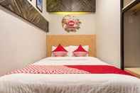 Bedroom SUPER OYO 456 Aljadid Guest House Syariah