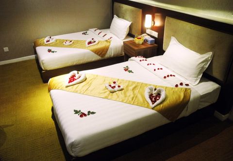 卧室 Sunny Holiday Hotel