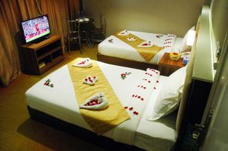 卧室 4 Sunny Holiday Hotel